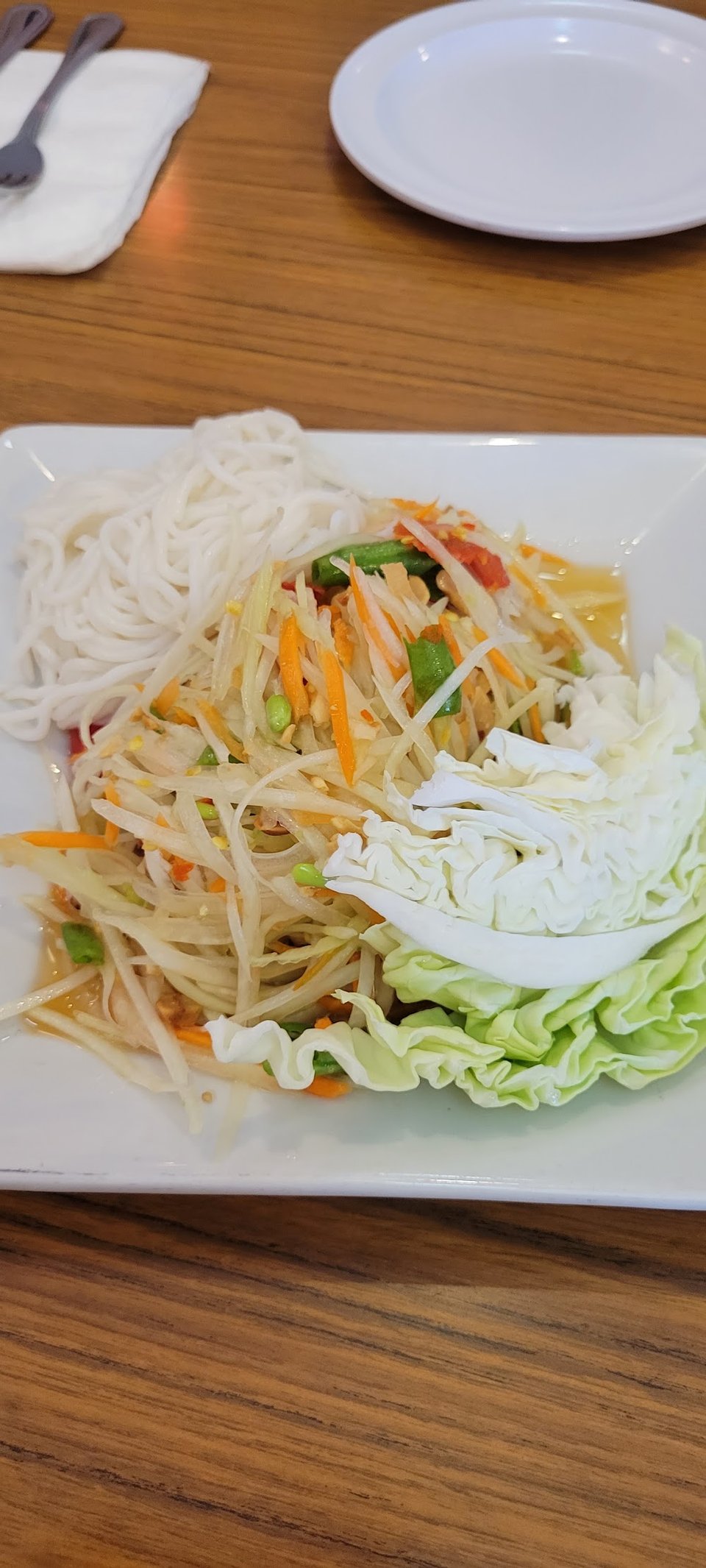 Thai menu layout with appetizer and curry sections.