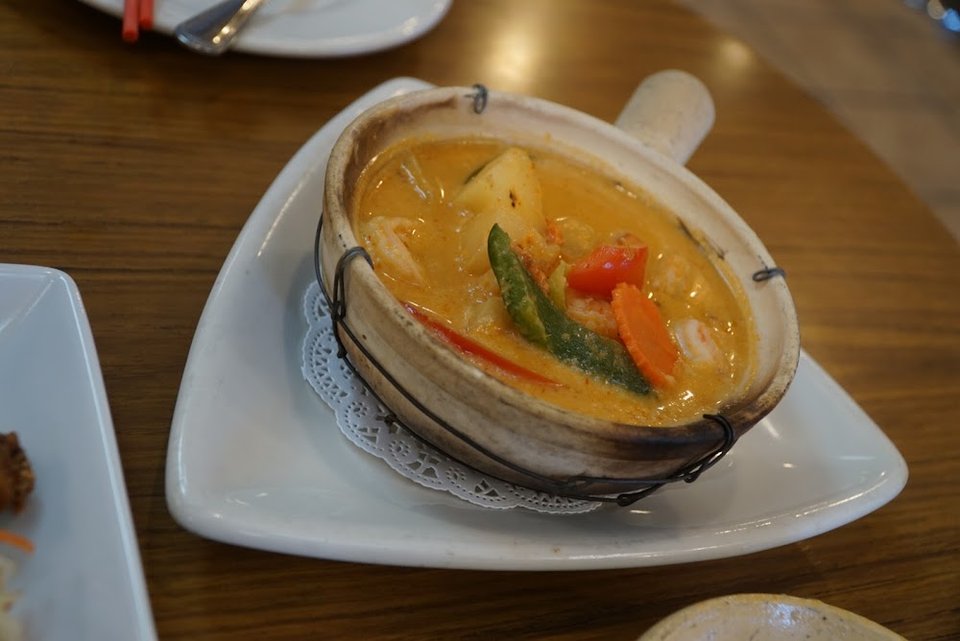 Menu page showing Thai soups and noodles.
