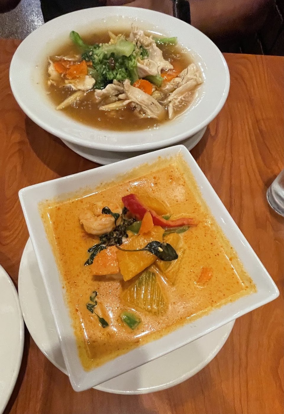 Printed menu with curry, salads, and stir-fried dishes.